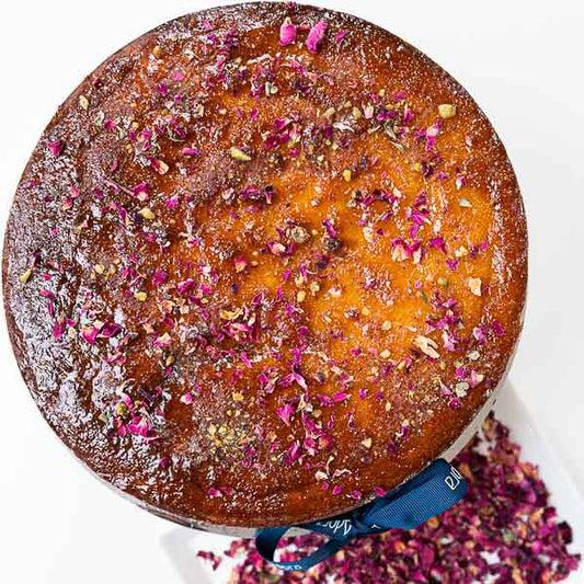 ORANGE FLOURLESS CAKE WITH PISTACHIO GLAZE - Adora Handmade Chocolates